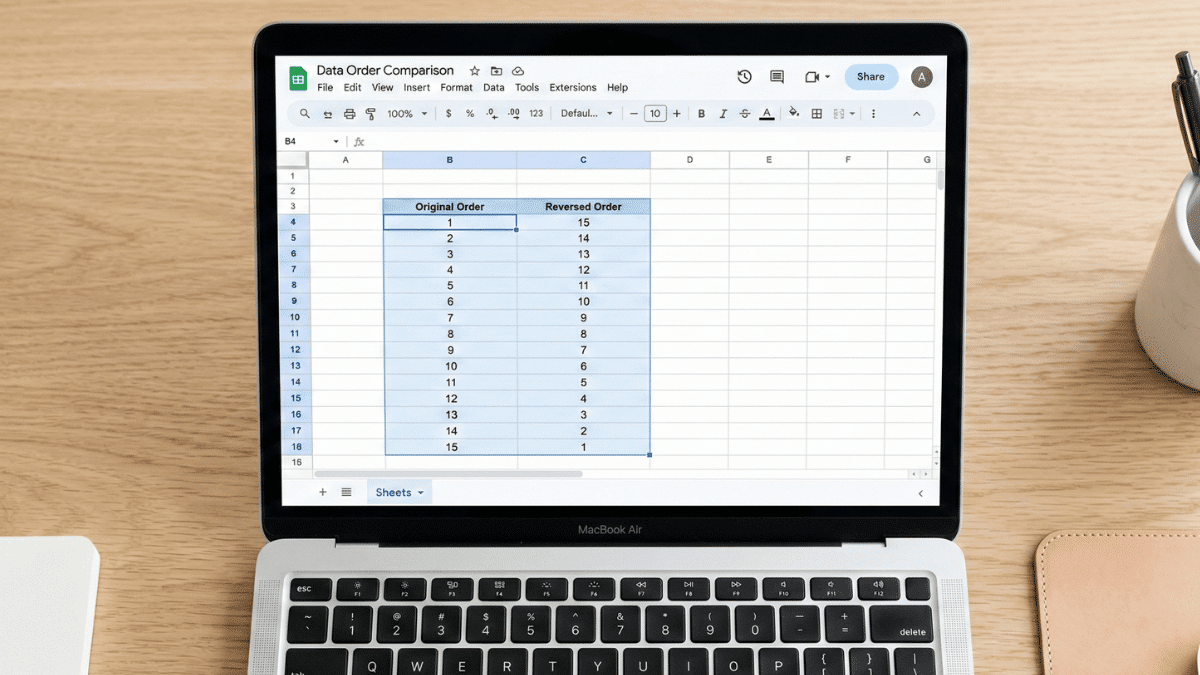 A macbook air showing how to reverse order in Google Sheets.