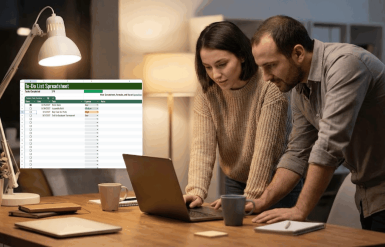 wo people reviewing a Google Sheets to-do list on a laptop