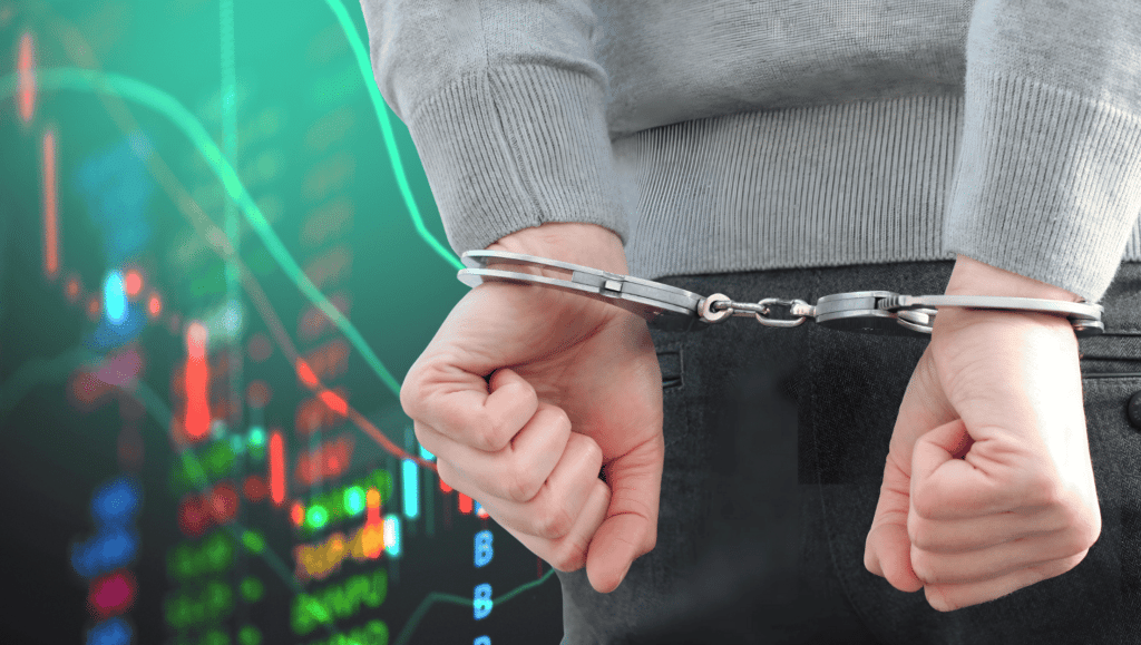 A man being arrested with the stock market visualized in the background.