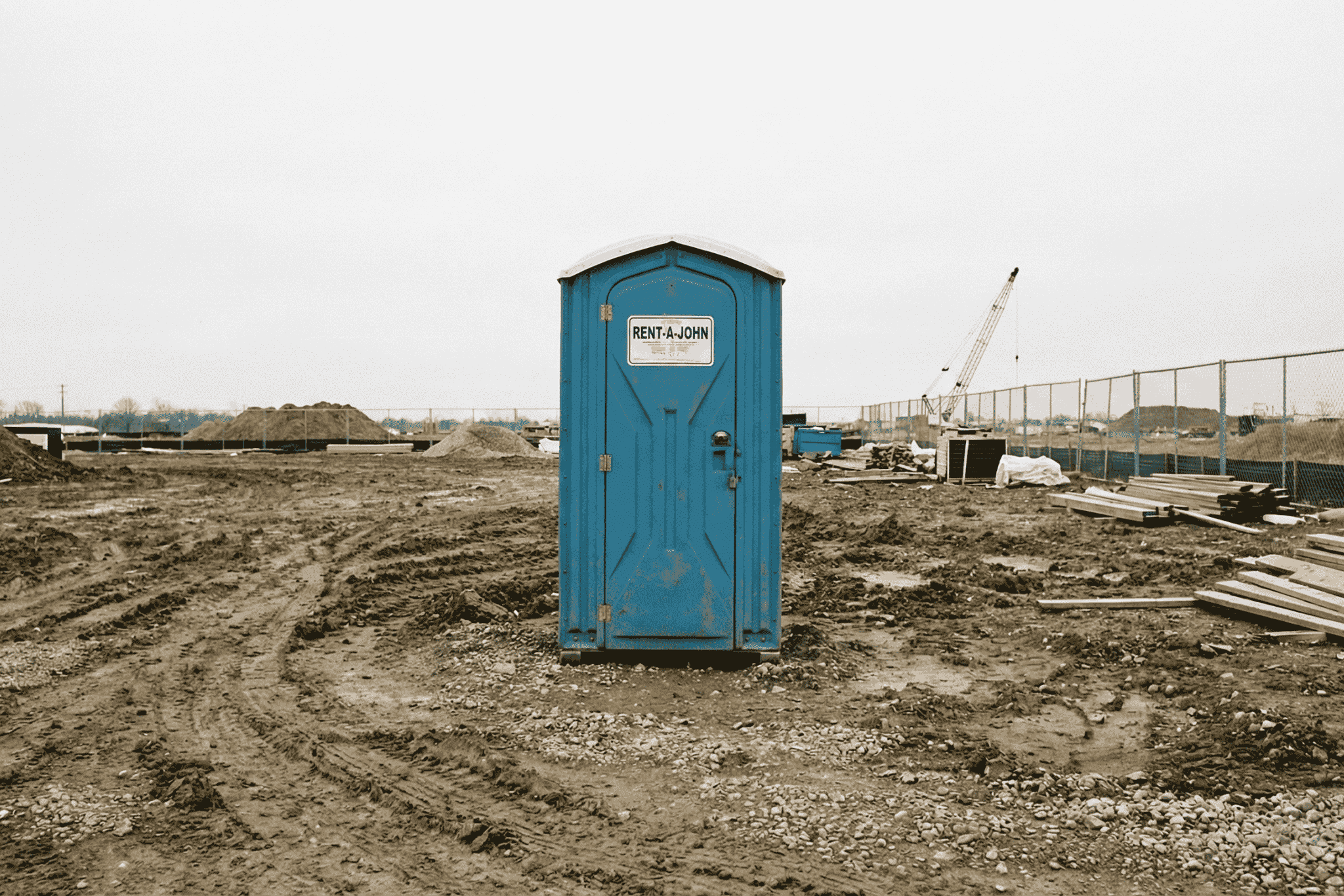 A portable toilet at a job site.